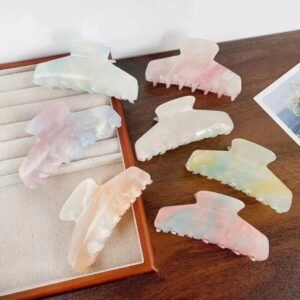 Color changing peach acetate claw clip before and after sun