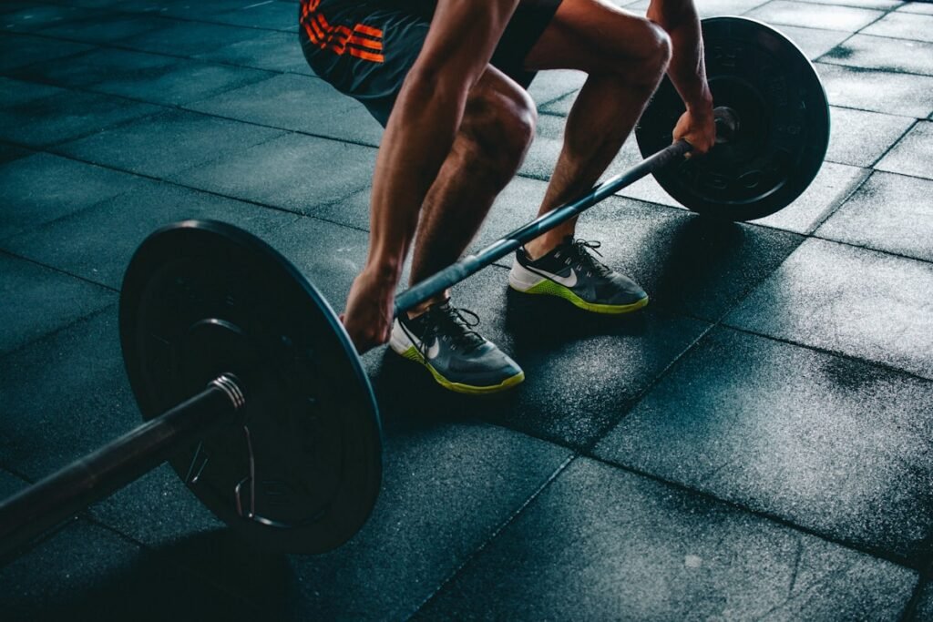 Budget home gym setup with dumbbells and weights in Canada